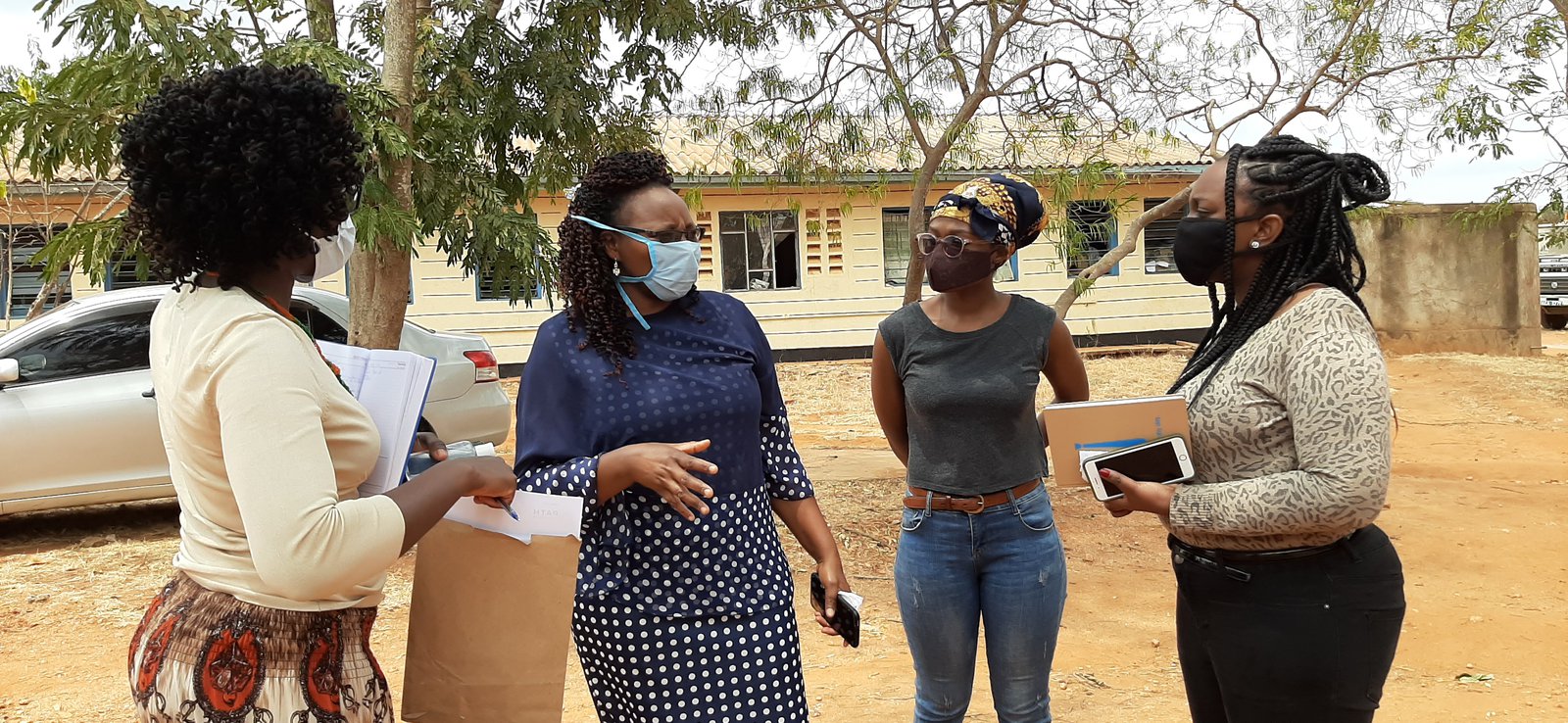 Livings Labs team members Wilkister Musau and Janet Muigai meet with Zippora Saitoti, the head maternity nurse at Kyuso District Hospital in Kitui County, Kenya.