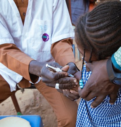 A child receives typhoid conjugate vaccine during Burkina Faso's introduction campaign. Photo: PATH/Build Africa Communications.
