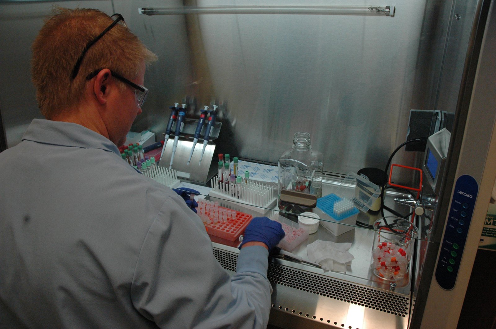 Roger Peck handling COVID-19 samples for the Washington COVID-19 Biorespository