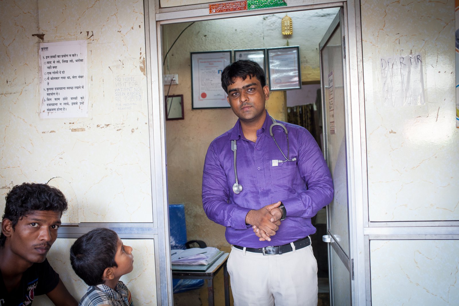 Dr. Imran Sheikh standing in the doorway of his office.