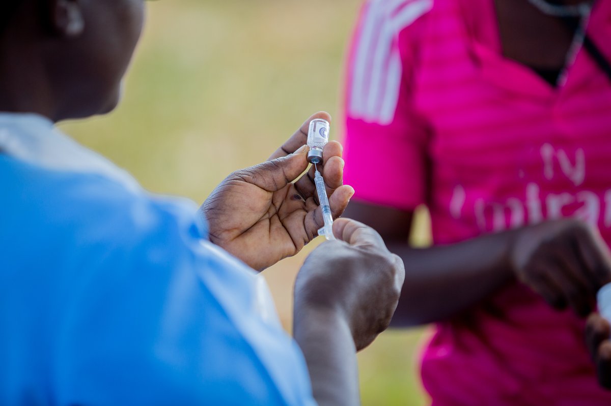 A health surveillance assistant prepares a dose of typhoid conjugate vaccine during Malawi's vaccine introduction campaign in 2023. Photo: PATH/Madalitso Mvula