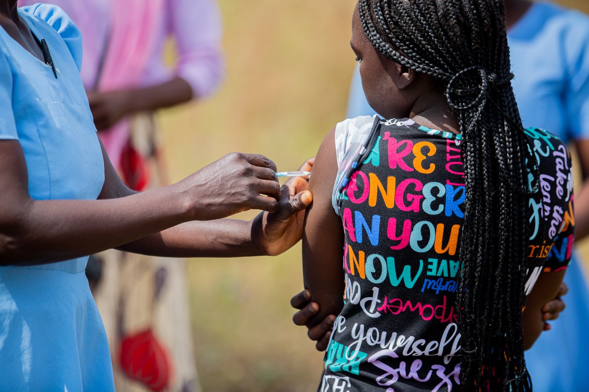 A child receives her typhoid conjugate vaccine at a mobile vaccination site in Lilongwe, Malawi. Photo: PATH/Madalitso Mvula..