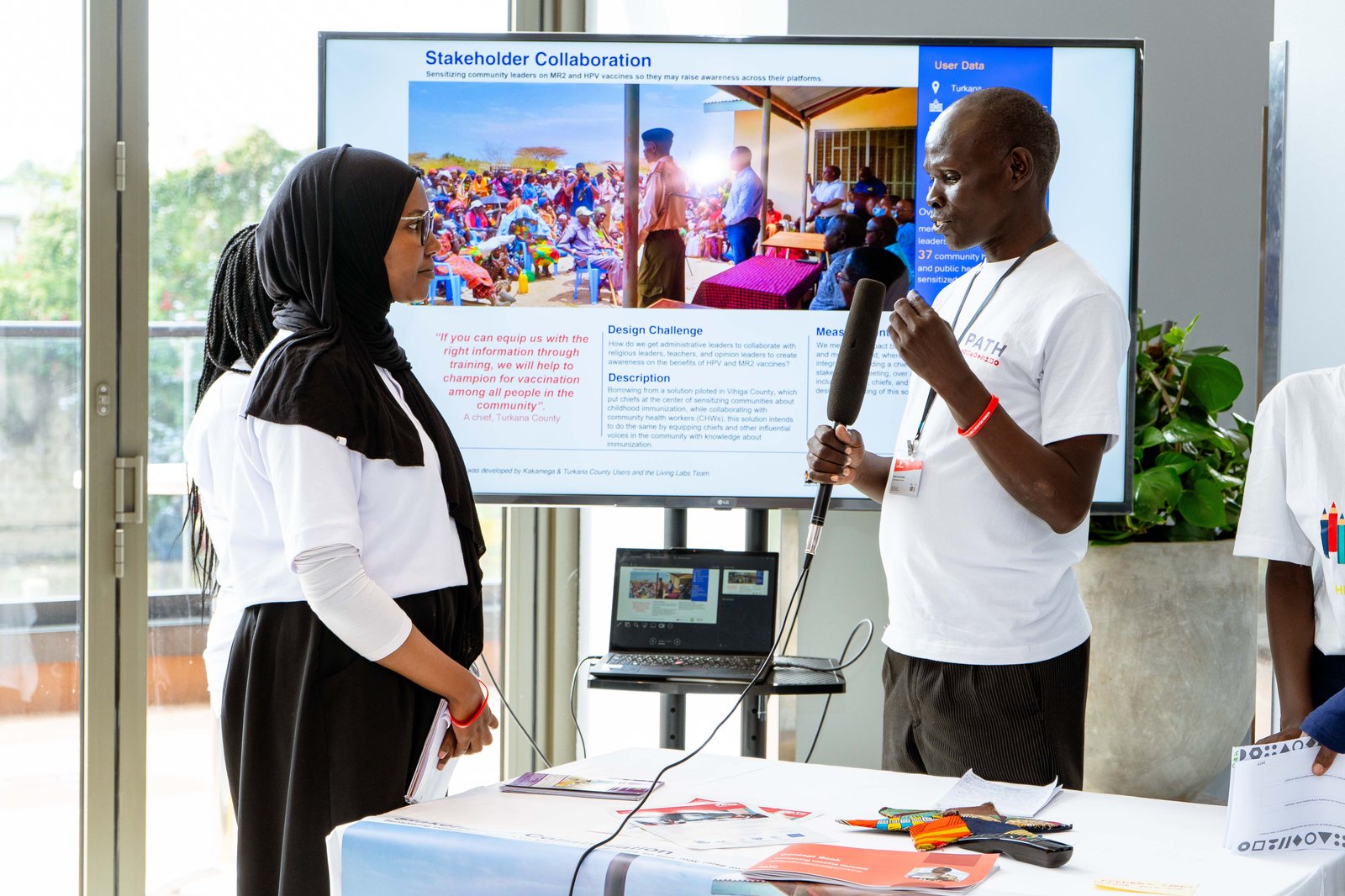 Photo: PATH. Living Labs team member, Shamim Omar speaks with the Chief of Kalokol Location, Turkana central subcounty about stakeholder collaboration.