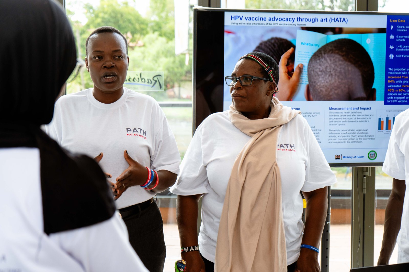 Photo: PATH. Living Lab users Caroline, a primary school teacher in Turkana County, and Saida, a community health advocate in Kakamega County, discuss HATA.