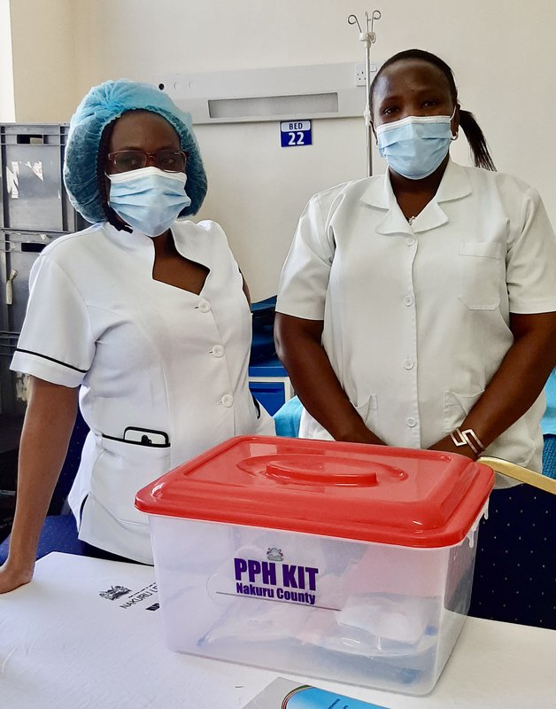 Maternity nurses in Nakuru, Kenya, displaying their postpartum hemorrhage (PPH) management kit. Photo: PATH.