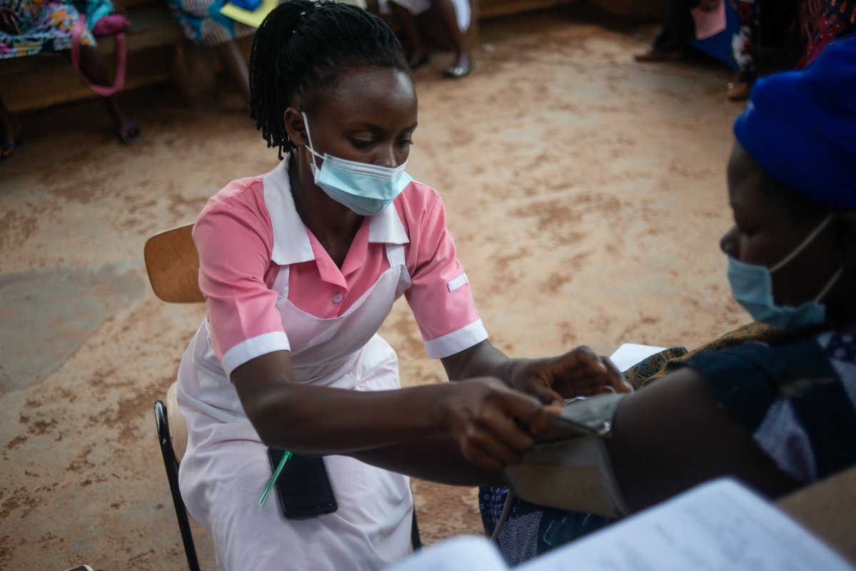 Nakalema Annet Doreen, a midwife at the maternity clinic in Mpigi Town, Uganda, conducts general health checks for expectant mothers. Photo: PATH/Wil