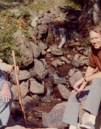 PATH’s three cofounders at a rocky stream.